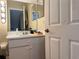 Bathroom with vanity, mirror, and toilet at 5607 Tanagergrove Way, Lithia, FL 33547