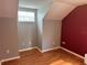 Bright bedroom with wood floors and a window at 5607 Tanagergrove Way, Lithia, FL 33547