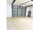 Clean garage, ideal for parking and storage at 5611 Riddle Rd, Holiday, FL 34690