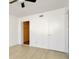 Bedroom with spacious closet and wood floors at 603 N Keene Rd # P12, Clearwater, FL 33755