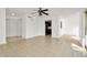 Open living room and kitchen area with tile floors at 603 N Keene Rd # P12, Clearwater, FL 33755