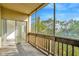 Bright screened balcony with sliding door access at 603 N Keene Rd # P12, Clearwater, FL 33755