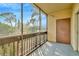 Spacious screened balcony overlooks lush greenery at 603 N Keene Rd # P12, Clearwater, FL 33755