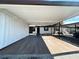 View of the home from the carport, with space for multiple vehicles at 6441 Drexel Dr # 7, Port Richey, FL 34668