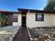 Charming single-story home featuring a neutral-colored exterior and easy-to-maintain landscaping at 6441 Drexel Dr # 7, Port Richey, FL 34668