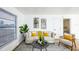 Light-filled living room with neutral tones and modern furniture at 6514 Mariner Blvd, Spring Hill, FL 34609