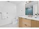 Clean bathroom, featuring a modern vanity and a walk-in shower at 7810 10Th S Ave, St Petersburg, FL 33707