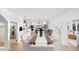 Bright dining room with a rustic wooden table and white chairs at 7810 10Th S Ave, St Petersburg, FL 33707