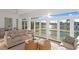 Living area with water views and double sofas at 7810 10Th S Ave, St Petersburg, FL 33707