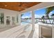 Outdoor patio with summer kitchen and water views at 7810 10Th S Ave, St Petersburg, FL 33707