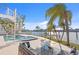 Inviting pool and spa area with water views at 7810 10Th S Ave, St Petersburg, FL 33707