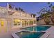 Luxury pool and spa with spiral staircase at 7810 10Th S Ave, St Petersburg, FL 33707