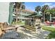 Exterior view of seating and patio area with shade at 801 83Rd N Ave # 217, St Petersburg, FL 33702