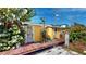 Wooden walkway to a colorful shed in the backyard at 830 S Davis Blvd, Tampa, FL 33606