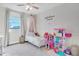 Charming bedroom with a twin bed and playful decor at 8416 121St Pl, Largo, FL 33773