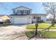 Two-story house with double garage and mailbox at 8416 121St Pl, Largo, FL 33773