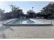 Community pool with many chairs in the area at 8608 Lake Isle Dr # 0, Temple Terrace, FL 33637