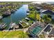 Stunning waterfront property featuring a private boat dock and screened pool for relaxing outdoor living at 952 Symphony Isles Blvd, Apollo Beach, FL 33572