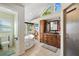 Bright bathroom with jetted tub, stained glass window, and a shower stall at 952 Symphony Isles Blvd, Apollo Beach, FL 33572