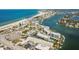 Aerial view of beachfront property with community pool and canal access at 9715 Harrell Ave # 25, Treasure Island, FL 33706