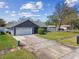 Charming single-story home with a two-car garage, landscaped front yard, and well-maintained driveway at 9942 56Th Way, Pinellas Park, FL 33782