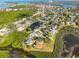 Aerial perspective of the neighborhood, highlighting the home's position and water views at 1016 Teal Pointe, Tarpon Springs, FL 34689