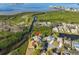 Bird's-eye view of the property, showcasing its waterfront location and surroundings at 1016 Teal Pointe, Tarpon Springs, FL 34689