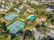 Community features include tennis courts, a swimming pool, and ample parking at 1016 Teal Pointe, Tarpon Springs, FL 34689