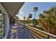 Elevated deck boasts peaceful water views, creating a serene outdoor retreat at 1016 Teal Pointe, Tarpon Springs, FL 34689