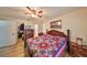 Main bedroom with large bed and access to bathroom at 1016 Teal Pointe, Tarpon Springs, FL 34689