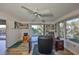 Home office with a desk, chair, and built-in shelving at 1016 Teal Pointe, Tarpon Springs, FL 34689