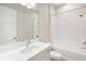 Clean bathroom, bathtub, and modern vanity at 10406 Longmeadow Ave, Parrish, FL 34219