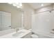 Clean bathroom with a shower/tub combo, vanity, and toilet at 10406 Longmeadow Ave, Parrish, FL 34219