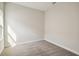 Bright bedroom with grey carpet and large window at 10406 Longmeadow Ave, Parrish, FL 34219