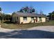 Ranch-style home with metal roof and spacious yard at 11217 Riverview Dr, Riverview, FL 33569