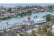 Aerial view of waterfront community, highlighting building location at 12080 Capri S Cir # 102, Treasure Island, FL 33706