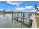 Expansive wooden dock offering scenic waterfront views at 12080 Capri S Cir # 102, Treasure Island, FL 33706