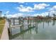 Community wooden dock perfect for enjoying the water at 12080 Capri S Cir # 102, Treasure Island, FL 33706