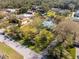 Property aerial showcasing generous lot size, mature trees, and the home's proximity to nearby amenities at 13050 110Th Ave, Largo, FL 33774