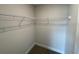 Well-organized closet with wire shelving and hanging rods at 13146 Kent Bradley St, Dade City, FL 33525