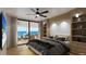 Main bedroom with ocean view, built-in shelves, and a relaxing atmosphere at 14046 Gulf Blvd # 2, Madeira Beach, FL 33708