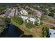 Beautiful condo community with a pond and lots of trees surrounding the property at 1450 Heather Ridge Blvd # 305, Dunedin, FL 34698