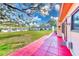 Community backyard with green space at 1505 Mission Hills Blvd # 4D, Clearwater, FL 33759