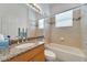 Clean bathroom with granite countertop and bathtub at 16028 Golden Lakes Dr, Wimauma, FL 33598