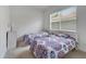 Bedroom with two twin beds and window at 16028 Golden Lakes Dr, Wimauma, FL 33598