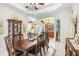 Elegant dining room with decorative details, decorative ceiling, and ample space at 1702 W Knights Griffin Rd, Plant City, FL 33565