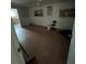 Spacious living room with tile floors and access to kitchen at 1819 Grand Blvd, Holiday, FL 34690