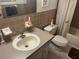 Bathroom with tub shower, toilet and vanity at 2263 Americus E Blvd # 59, Clearwater, FL 33763