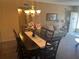 Dining area with a table and chairs near the kitchen at 2263 Americus E Blvd # 59, Clearwater, FL 33763