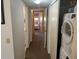 Hallway with access to bedroom and laundry at 2263 Americus E Blvd # 59, Clearwater, FL 33763